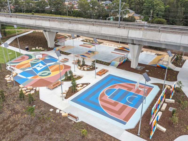 Beaumont Hills Park with multipurpose court featuring colourful linemarking / half basketball court Location: Beaumont Hills Park / Source: Department of Planning, Housing and Infrastructure (artwork by Beastman)